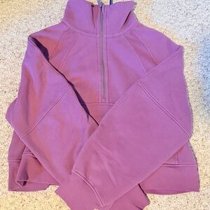 Lululemon Scuba Oversized Funnel Neck Half
Zip in the color Velvet Dust.